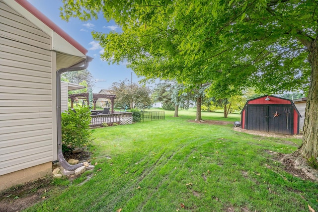 844 Reservoir Rd, Bellefontaine, OH 43311 - view of green lawn with a storage shed