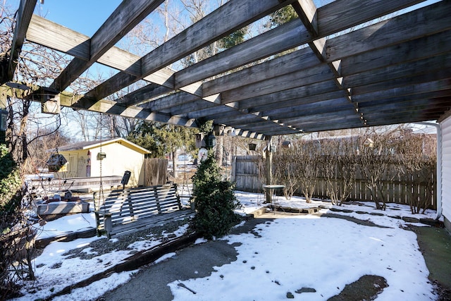 exterior space featuring an outdoor structure and a pergola