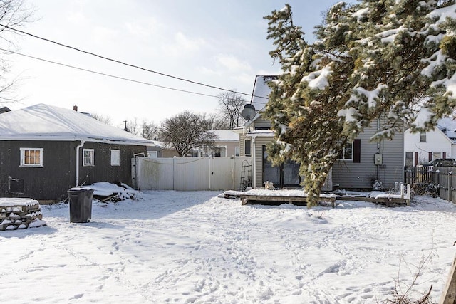 view of yard covered in snow