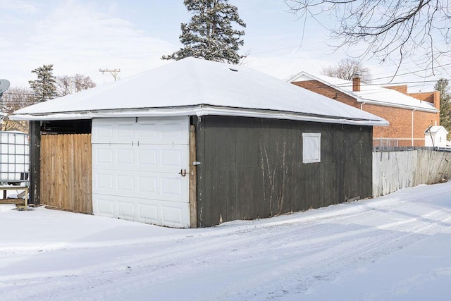 view of snow covered garage