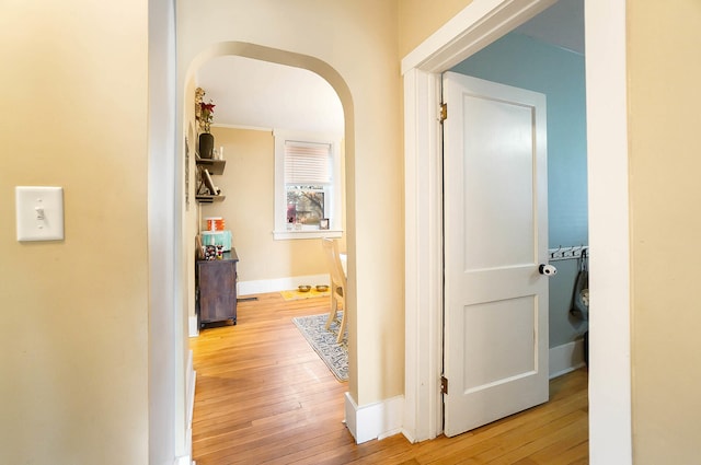 corridor featuring wood-type flooring