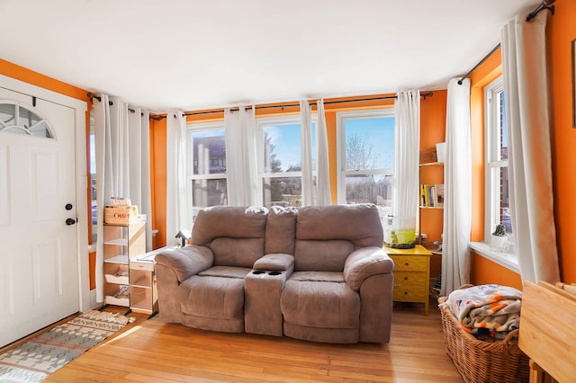 living room with light hardwood / wood-style floors