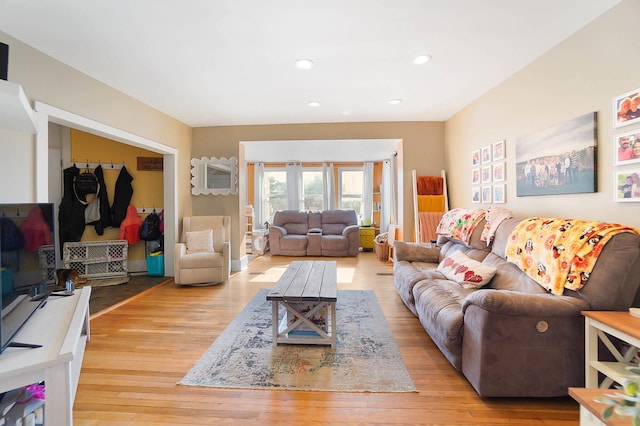 living room with light hardwood / wood-style floors