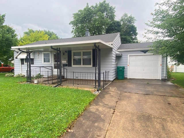 2647 Allen Dr, Springfield, OH 45505 - single story home featuring a front lawn, a garage, driveway, and a shingled roof