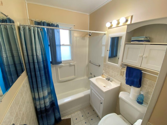2647 Allen Dr, Springfield, OH 45505 - full bath featuring shower / tub combo, vanity, tile walls, and ornamental molding