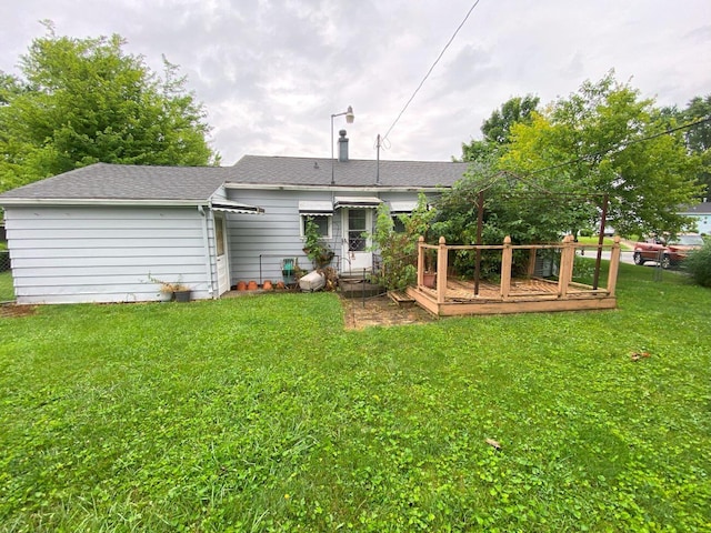 2647 Allen Dr, Springfield, OH 45505 - back of property featuring a lawn and roof with shingles