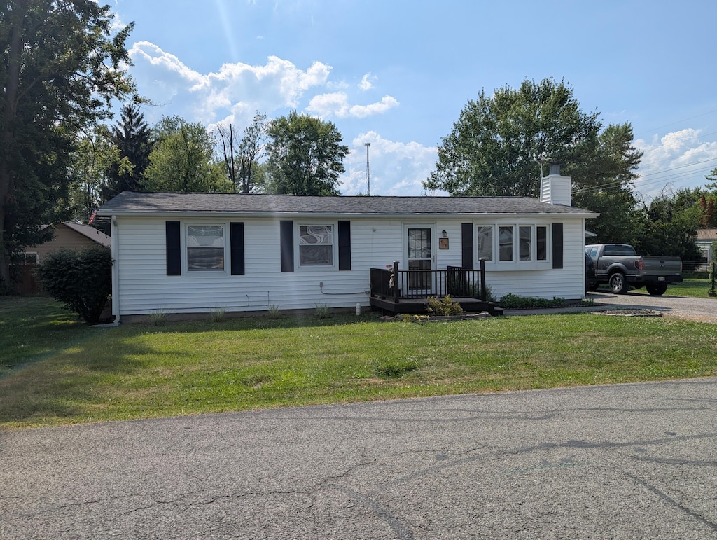 418 High Ave, Russells Point, OH 43348 - ranch-style house with a chimney and a front lawn