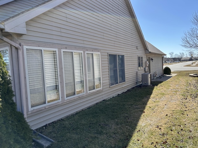 view of property exterior featuring a yard