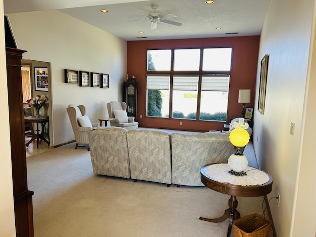 living area featuring recessed lighting, carpet floors, and ceiling fan