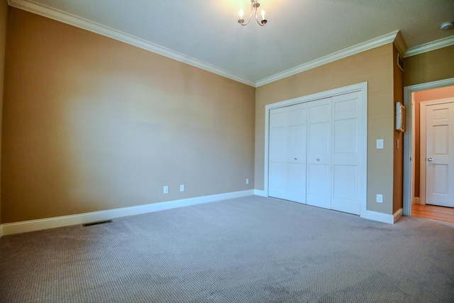 1205 Daylily Way, Troy, OH 45373 - unfurnished bedroom featuring carpet flooring, ornamental molding, and a closet