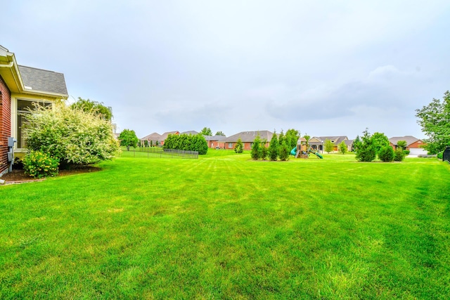 1205 Daylily Way, Troy, OH 45373 - view of yard featuring a playground and a residential view
