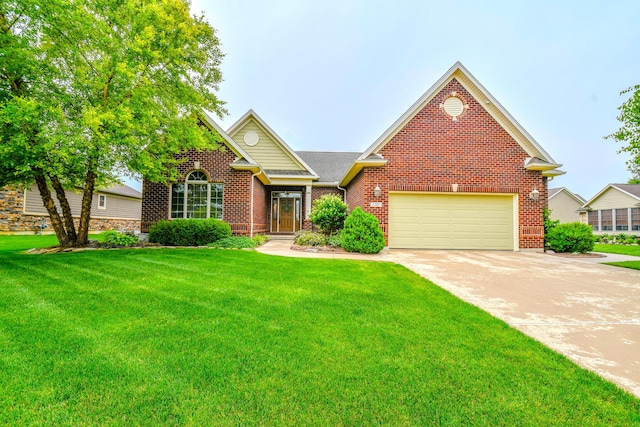 1205 Daylily Way, Troy, OH 45373 - view of front of property with brick siding, a front lawn, and concrete driveway