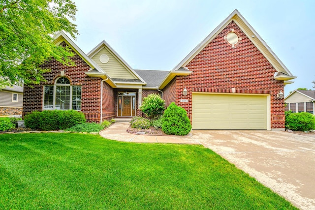 1205 Daylily Way, Troy, OH 45373 - view of front of house featuring brick siding, a front yard, and concrete driveway