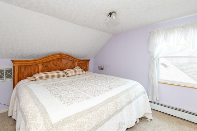 bedroom featuring lofted ceiling, a baseboard heating unit, and light colored carpet