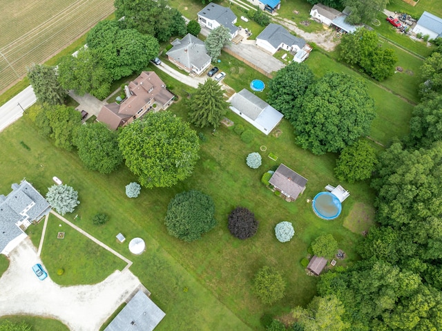 birds eye view of property with a residential view