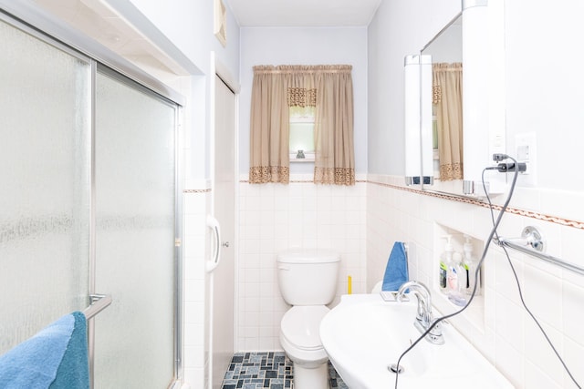 full bathroom with visible vents, a stall shower, toilet, and tile walls