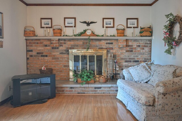 5283 Willow Dale Rd, Urbana, OH 43078 - living room with crown molding, a wood stove, and wood finished floors