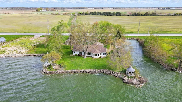 drone / aerial view with a water view and a rural view