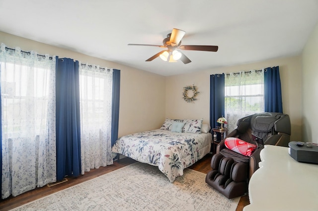2206 State Route 56, London, OH 43140 - bedroom with multiple windows, wood finished floors, and a ceiling fan