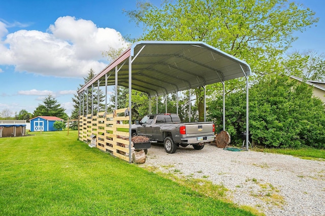 2206 State Route 56, London, OH 43140 - view of parking featuring a shed, gravel driveway, and a detached carport