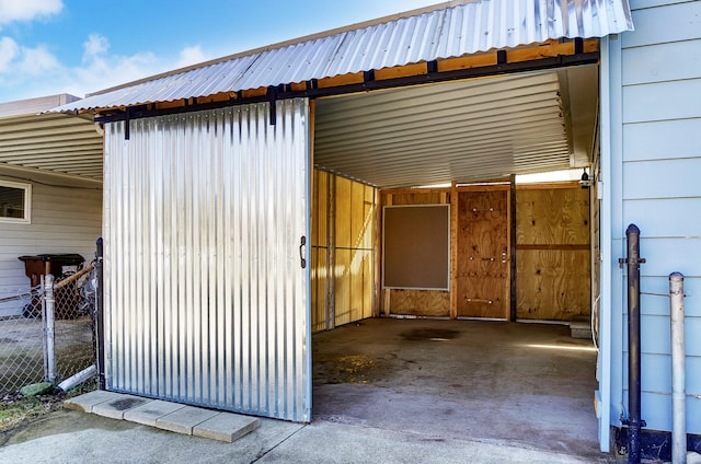 exterior space with a carport