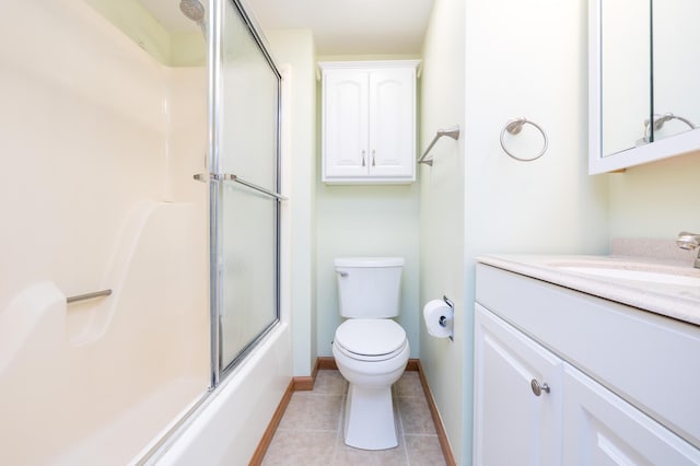 full bathroom with enclosed tub / shower combo, vanity, toilet, and tile patterned flooring