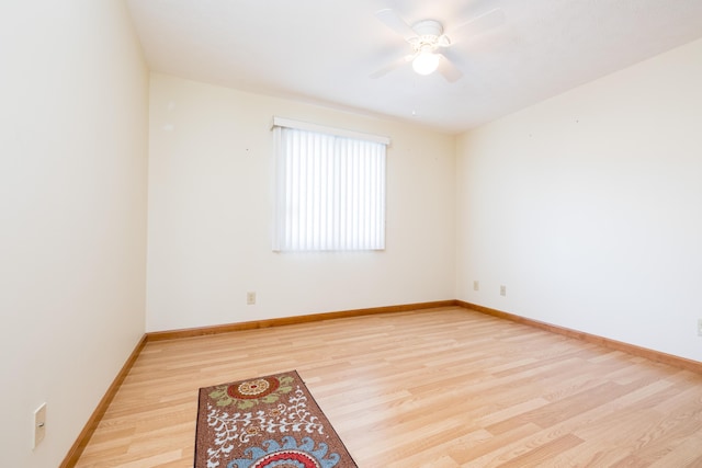 empty room with light hardwood / wood-style floors and ceiling fan