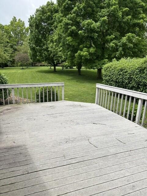 207 Meadowbrook Ln, Saint Marys, OH 45885 - wooden deck featuring a yard
