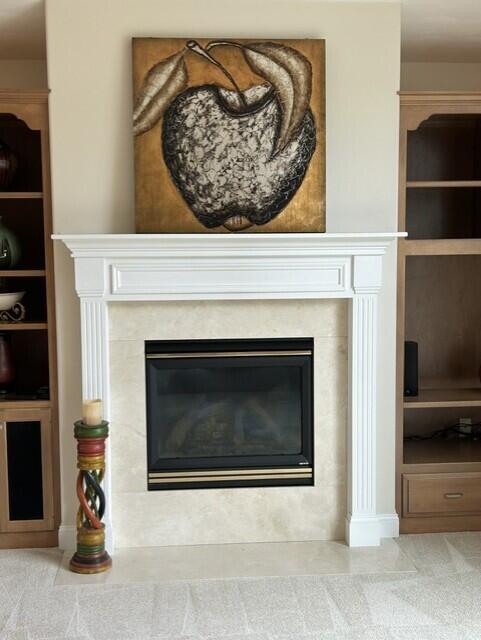 207 Meadowbrook Ln, Saint Marys, OH 45885 - detailed view of a tiled fireplace and carpet floors