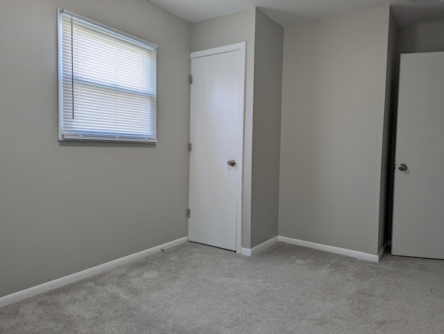 1124 Bookwalter Ave, New Carlisle, OH 45344 - unfurnished bedroom with light carpet and baseboards
