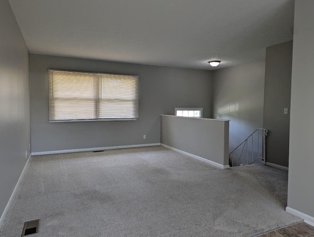 1124 Bookwalter Ave, New Carlisle, OH 45344 - carpeted empty room with baseboards