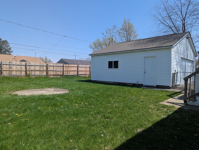 1124 Bookwalter Ave, New Carlisle, OH 45344 - view of yard with an outbuilding and a garage