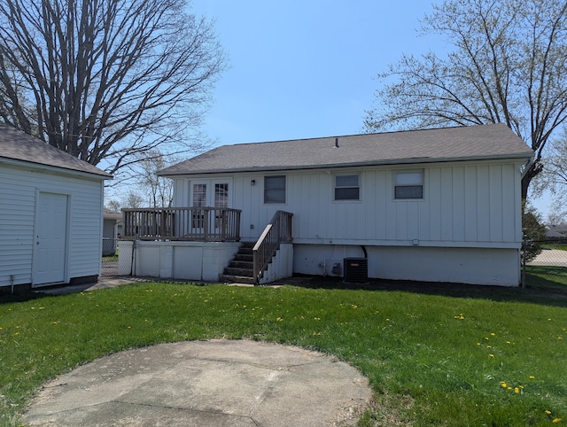1124 Bookwalter Ave, New Carlisle, OH 45344 - back of house featuring a wooden deck, central AC, roof with shingles, a patio, and stairs