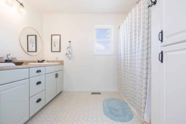 bathroom featuring vanity