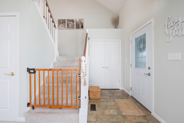 entryway with vaulted ceiling