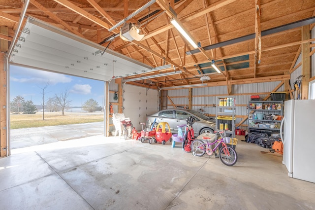 garage featuring white refrigerator