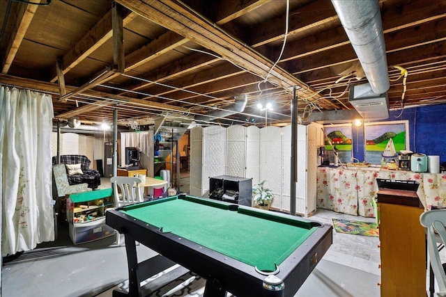 game room with pool table and concrete flooring