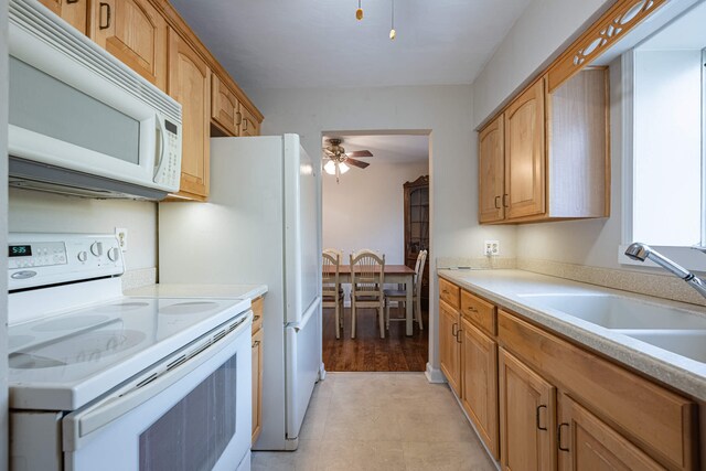 306 S 7th St, Miamisburg, OH 45342 - kitchen with a sink, light countertops, a ceiling fan, and white appliances