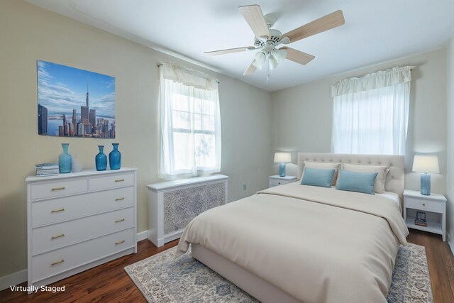 306 S 7th St, Miamisburg, OH 45342 - bedroom featuring dark wood-type flooring, a ceiling fan, radiator, and baseboards