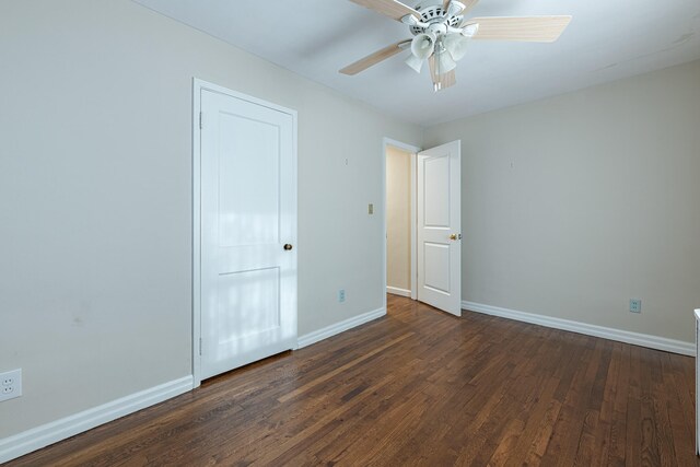 306 S 7th St, Miamisburg, OH 45342 - unfurnished bedroom featuring baseboards, a ceiling fan, and wood finished floors