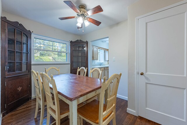 306 S 7th St, Miamisburg, OH 45342 - dining area with baseboards, ceiling fan, and wood finished floors