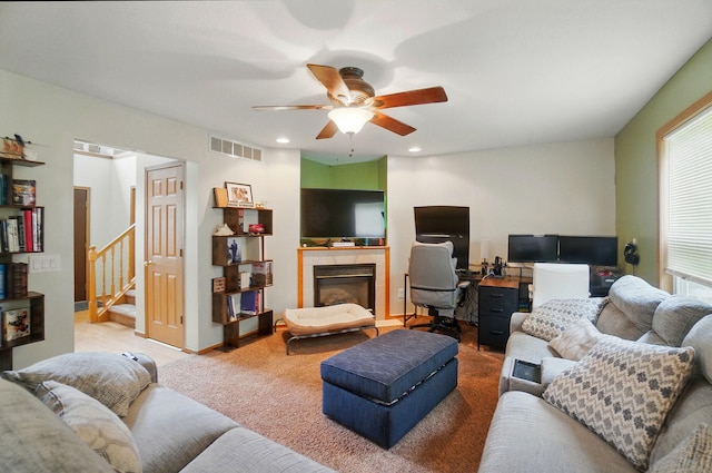1820 Bishop Ln, Findlay, OH 45840 - living room with a ceiling fan, stairs, carpet, a tile fireplace, and recessed lighting