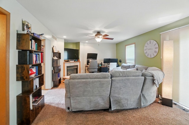 1820 Bishop Ln, Findlay, OH 45840 - carpeted living room featuring a ceiling fan, a glass covered fireplace, recessed lighting, and an office area