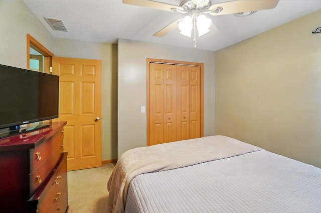 1820 Bishop Ln, Findlay, OH 45840 - bedroom with light carpet, a closet, ceiling fan, and baseboards