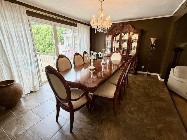 1337 Stratford Dr, Piqua, OH 45356 - tiled dining room with a chandelier and baseboards