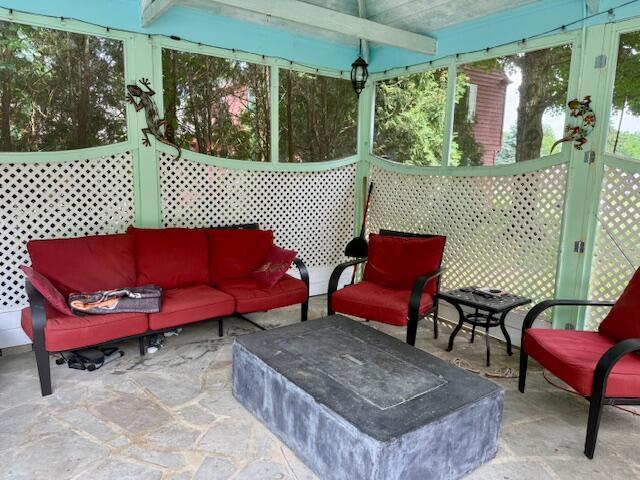1337 Stratford Dr, Piqua, OH 45356 - sunroom with an outdoor living space and beam ceiling