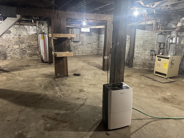 1108 N Fountain Blvd, Springfield, OH 45504 - unfinished below grade area with gas water heater, electric panel, and a heating unit