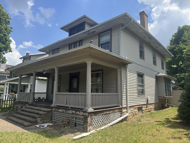 1108 N Fountain Blvd, Springfield, OH 45504 - view of front of property with covered porch and a chimney