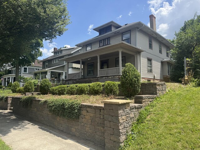 1108 N Fountain Blvd, Springfield, OH 45504 - american foursquare style home with covered porch and a chimney