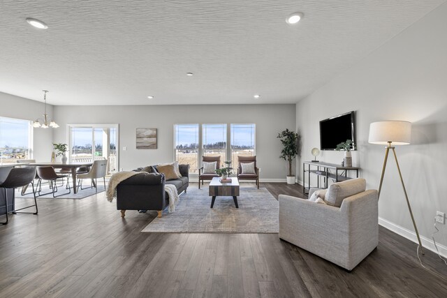 1304 Township Rd Unit 179, Bellefontaine, OH 43311 - living room with visible vents, baseboards, and wood finished floors